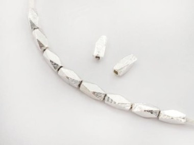 Karen Hill Tribe Silver Faceted Oval Beads 3x7mm.