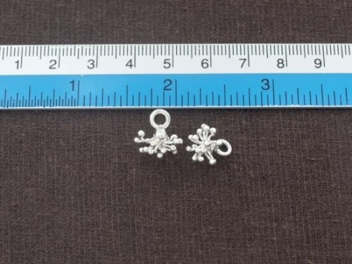 4 of Karen Hill Tribe Silver Flower Charms 7x11.5 mm.