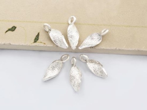 6 of Karen Hill Tribe Silver Textured Curve Leaf Charms 5x12mm.