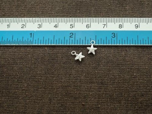 10 of 925 Sterling Silver Star Charms 6 mm.