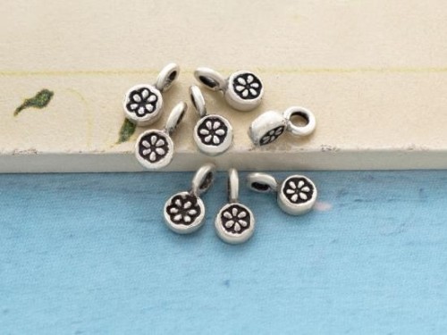 8 of Karen Hill Tribe Silver Daisy Imprint Charms 5 mm.