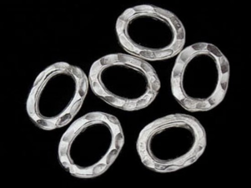 8 of Karen Hill Tribe Silver Hammer Oval Closed Jump Rings 6.5x9 mm.