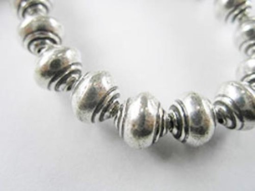 4 of Karen Hill Tribe Silver Shell Beads 8 x 9 mm.