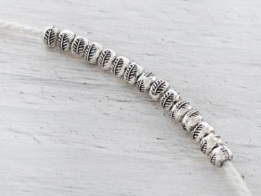 15 of Karen Hill Tribe Silver Leaf Imprint Beads 5x3.5 mm.