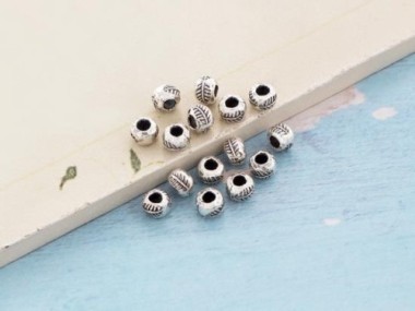 Karen Hill Tribe Silver Leaf Imprint Beads 5x3.5 mm.