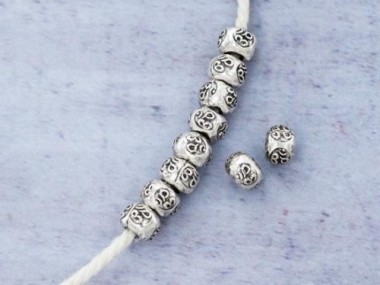 Karen Hill Tribe Silver Ohm Imprint Beads 6x4.3 mm.