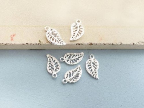 6 of 925 Sterling Silver Cutwork Leaf Charms 6x10 mm.