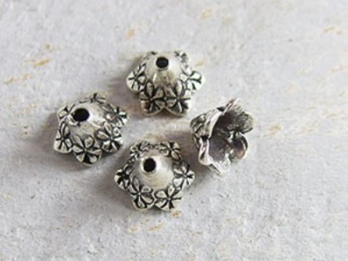 8 of Karen Hill Tribe Silver Flower Bead Caps 6x8 mm.