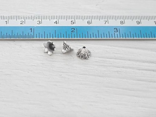 8 of Karen Hill Tribe Silver Flower Bead Caps 6x8 mm.