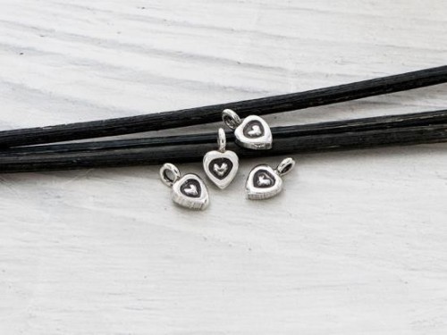 4 of Karen Hill Tribe Silver Imprinted Heart Charms 7x6 mm.