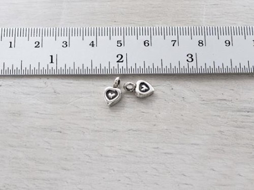 4 of Karen Hill Tribe Silver Imprinted Heart Charms 7x6 mm.