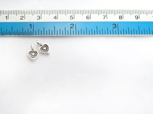 6 of Karen Hill Tribe Silver Heart Charms 6.5 mm.