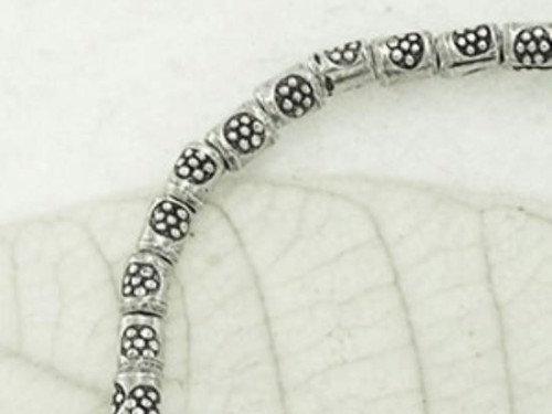 60 of Karen Hill Tribe Silver Daisy Printed Spacer Beads 2.2 x 3.2 mm.