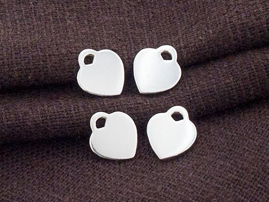 4 of 925 Sterling Silver Heart Charms 8x9 mm.