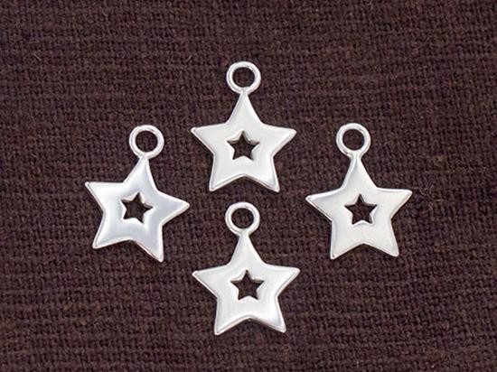 4 of 925 Sterling Silver Star Charms 10 mm.