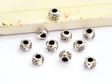 Karen Hill Tribe Silver Ohm Imprinted Beads 5x4 mm.