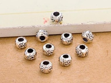 Karen Hill Tribe Silver Ohm Imprinted Beads 5x4 mm.