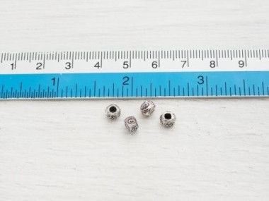 Karen Hill Tribe Silver Ohm Imprinted Beads 5x4 mm.