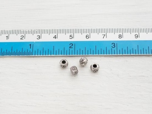 20 of Karen Hill Tribe Silver Ohm Imprinted Beads 5x4 mm.