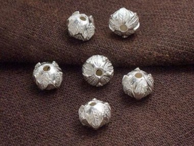 6 of Karen Hill Tribe Silver Wild Nut Beads 9x7 mm.