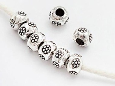 8 of Karen Hill Tribe Silver Daisy Imprint Rondelle Beads 7x5mm.