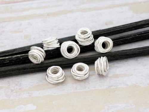 8 of Karen Hill Tribe Silver Wire Drum Beads 6x4 mm.