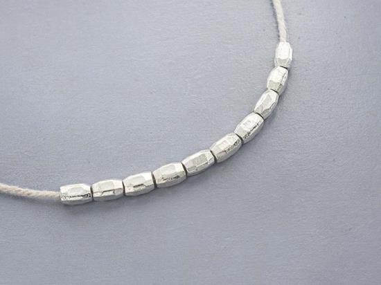 10 of Karen Hill Tribe Silver Faceted Oval Beads 3.5x6 mm.