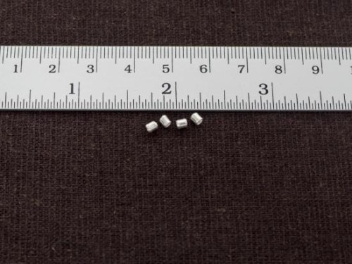 65 of Karen Hill Tribe Silver Plain Spacer Beads 2.5x2.6mm. 7 inches.