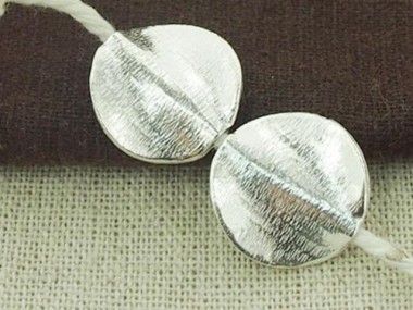 Karen Hill Tribe Silver Textured Twisted Disc Beads 17 mm.