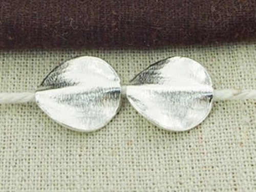 2 of Karen Hill Tribe Silver Textured Twisted Disc Beads 17 mm.