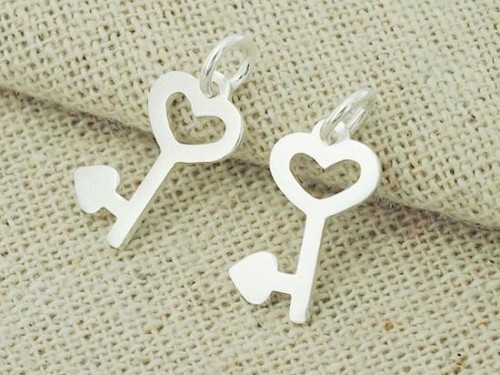 4 of 925 Sterling Silver Heart Key Charms 8x14 mm.