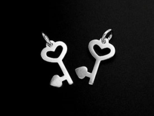 4 of 925 Sterling Silver Heart Key Charms 8x14 mm.