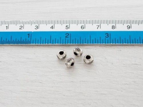 10 of Karen Hill Tribe Silver Leaf Imprint Beads 6 x 4.5 mm.