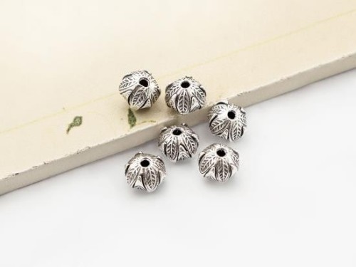 6 of Karen Hill Tribe Silver Wild Nut Beads 9x7 mm.