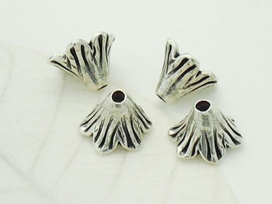 8 of Karen Hill Tribe Silver Flower Bead Caps 5x8 mm.