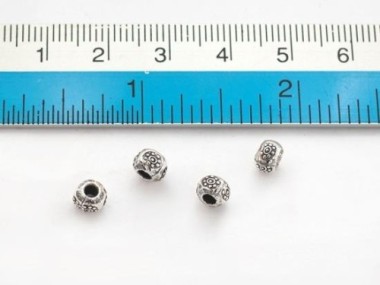 Karen Hill Tribe Silver Daisy Imprint Beads 5x3.5 mm.