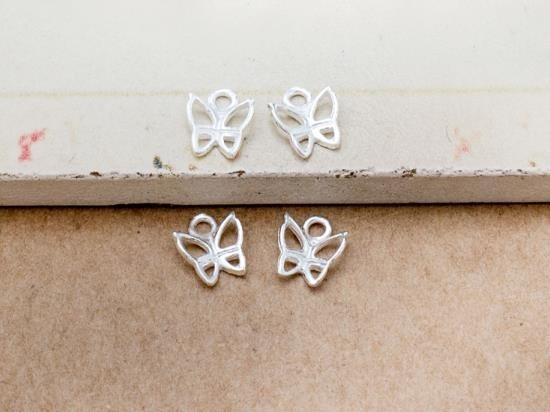 4 of 925 Sterling Silver Small Butterfly Charms 6.5 mm.