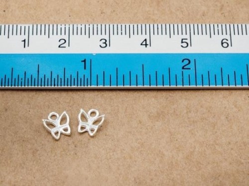 4 of 925 Sterling Silver Small Butterfly Charms 6.5 mm.