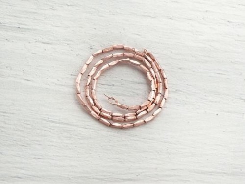 65 of Karen hill tribe Silver Rose Gold Vermeil Style Faceted Beads 1x3 mm. 8.5 inches