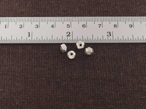 8 of Karen Hill Tribe Silver Facet Beads 5.5x3.5 mm.