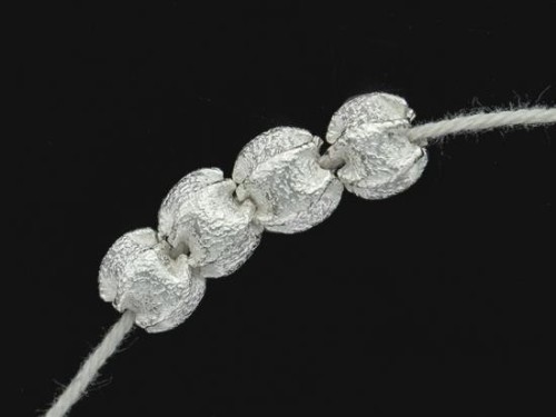 4 of Karen Hill Tribe Silver Textured Pleat Beads 8x9 mm.