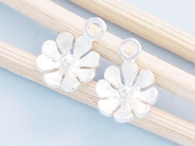 4 of 925 Sterling Silver Small Flower Charms 7 mm.