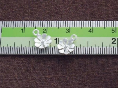 4 of 925 Sterling Silver Small Flower Charms 7 mm.