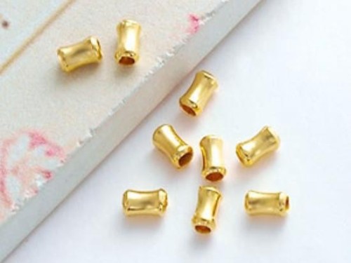 30 of Karen Hill Tribe Gold Vermeil Style Hourglass Beads 2x4 mm.