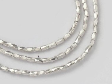 Karen Hill Tribe Silver Little Faceted Beads 1.2x2.5 mm.