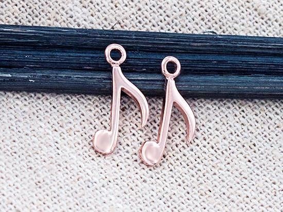 2 of 925 Sterling Silver Rose Gold Vermeil Style Music Note Charms 7x15mm.