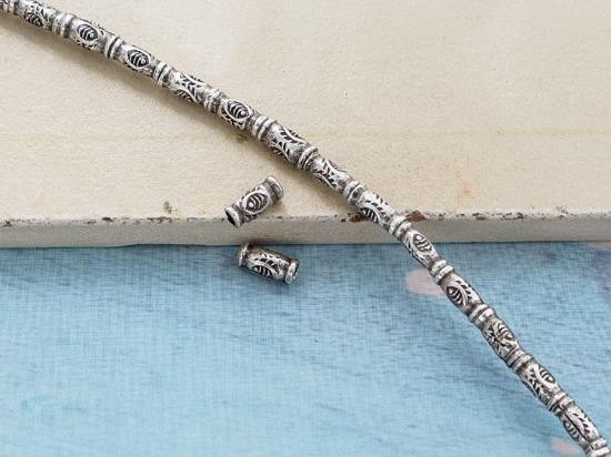 45 of Karen Hill Tribe Silver Sun Printed Bamboo Beads 2x5mm., 9 "