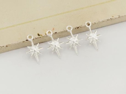 4 of 925 Sterling Silver Star Charms 8x11 mm.