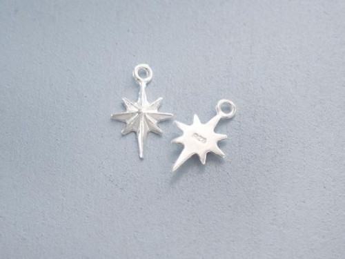 4 of 925 Sterling Silver Star Charms 8x11 mm.