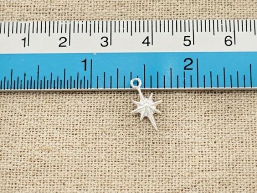 4 of 925 Sterling Silver Star Charms 8x11 mm.